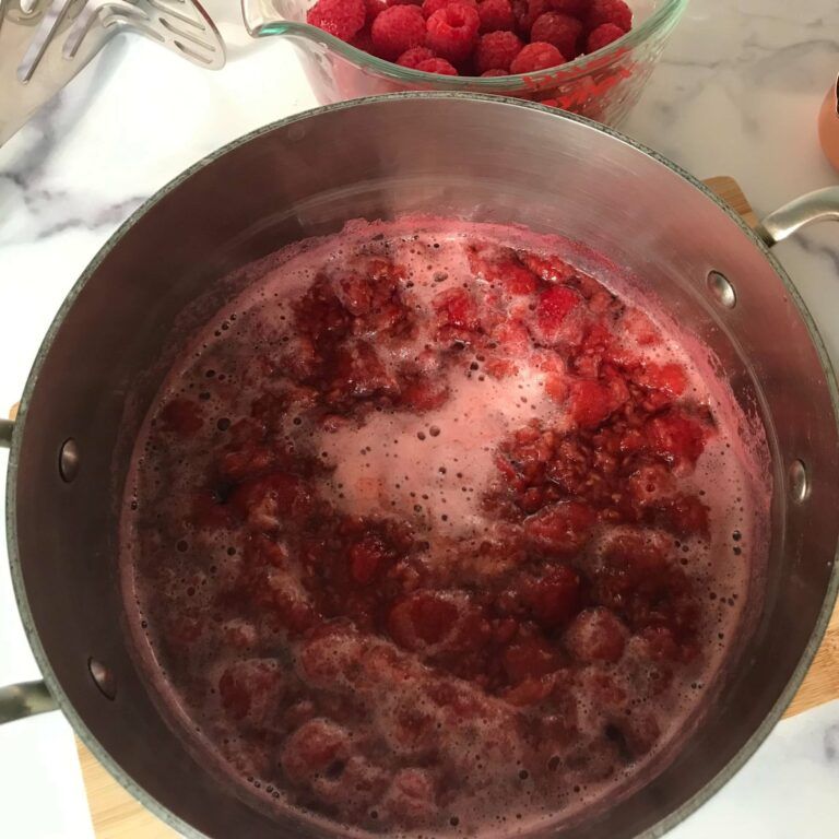 boiling pot of raspberries and sugar substitute.