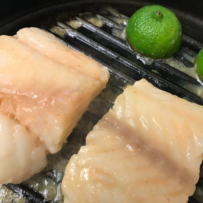 cod and lime cooking on grill pan