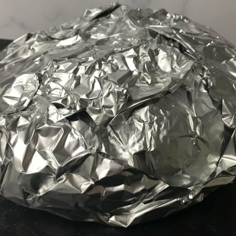 loaf of bread covered in foil