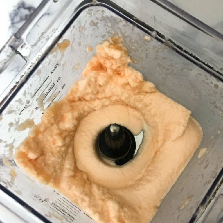 overhead view of whipped cantaloupe in a blender