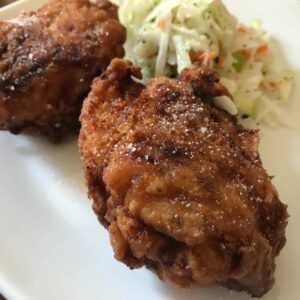 fried chicken and coleslaw on a plate