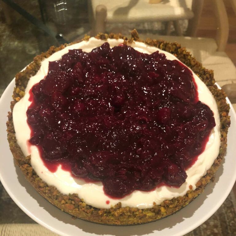 finished cheesecake on a platter.