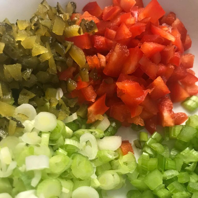 chopped veggies and pickles in a bowl