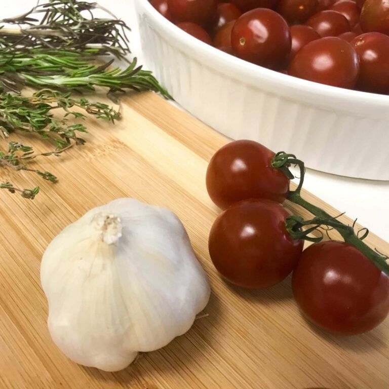 raw ingredients for sauce on cutting board