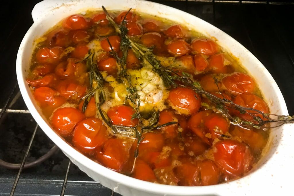 roasted tomatoes in olive oil cooked in the oven