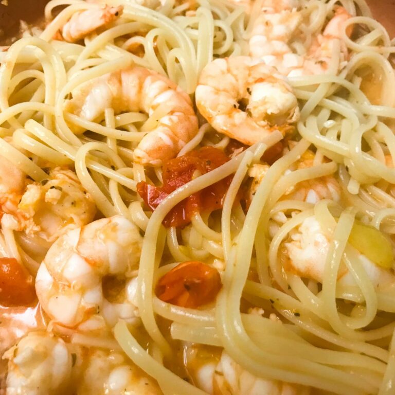 shrimp, pasta and fresh tomato sauce tossed in a skillet