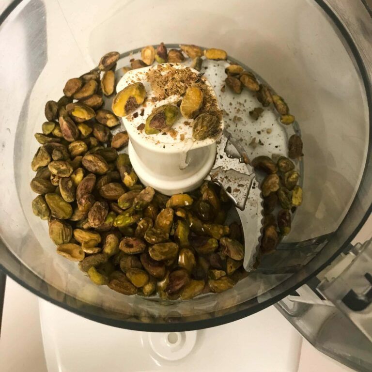 nuts and corn syrup in food processor