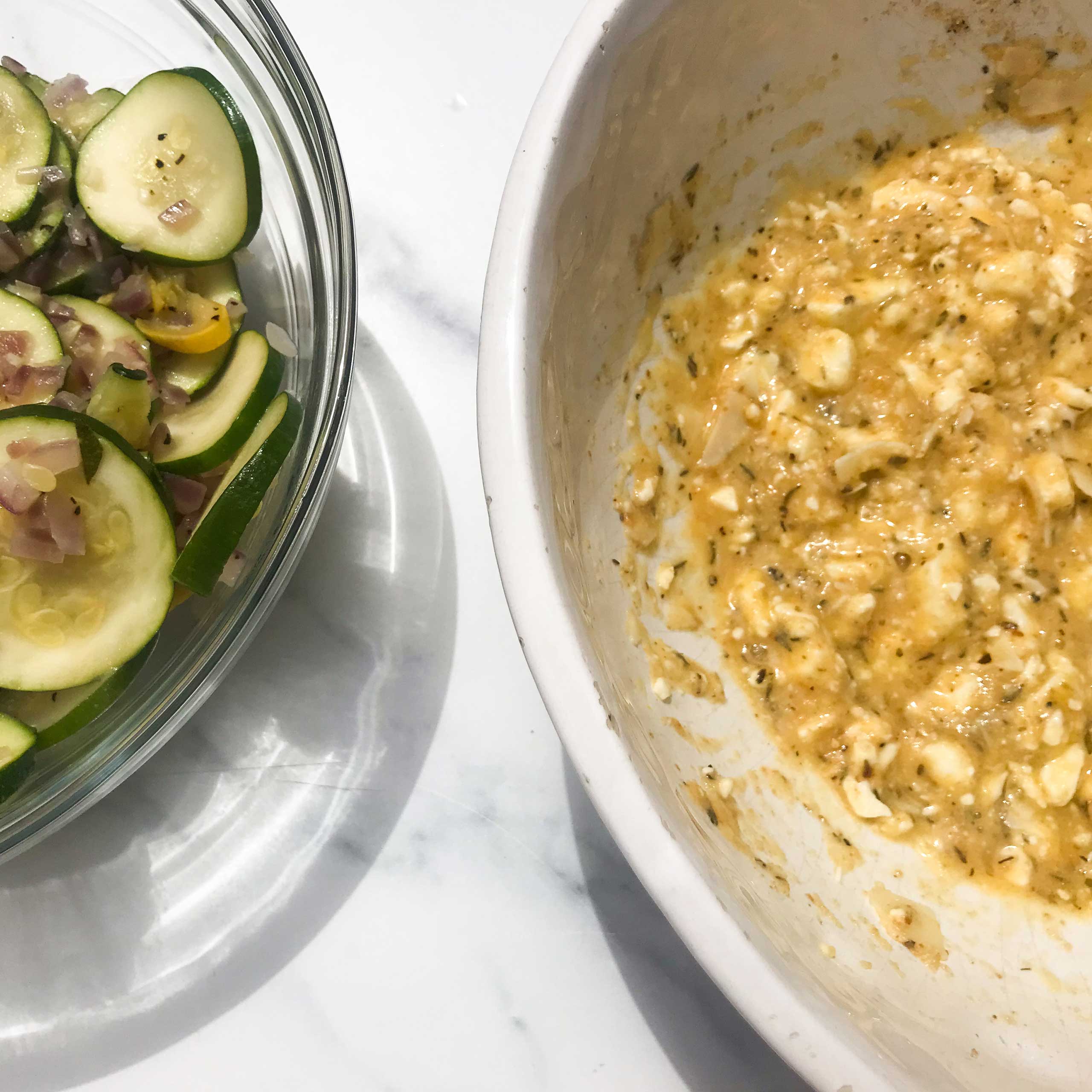 bowl of cooking zucchini next to bowl of mixed wet ingredients