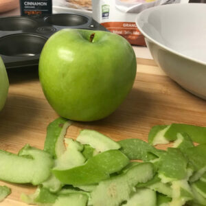 apple on cutting board.