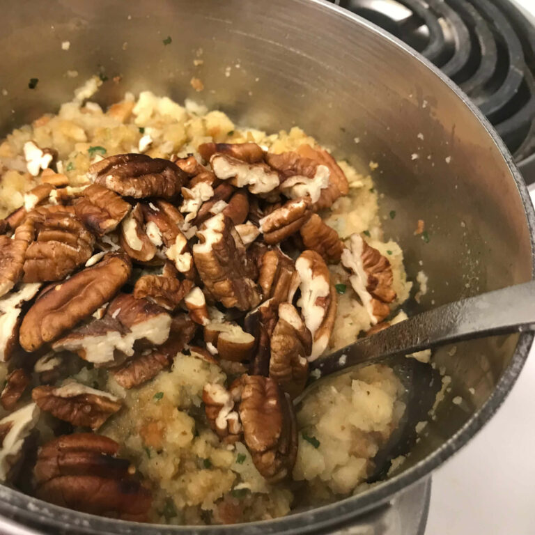 pecans and stuffing in a pot