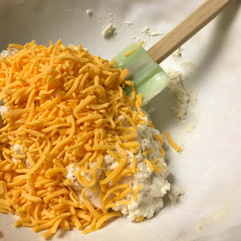biscuit dough with cheese in a bowl