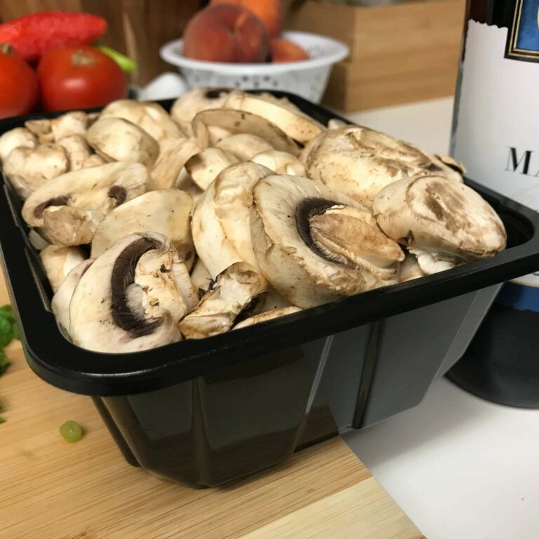 sliced mushrooms in a container