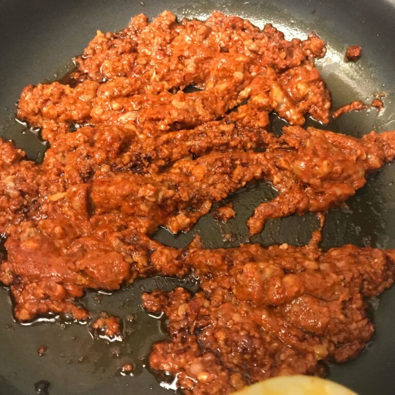 chorizo cooking in skillet