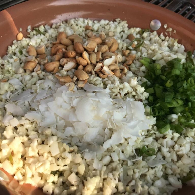 up close view of all rice ingredients in a skillet