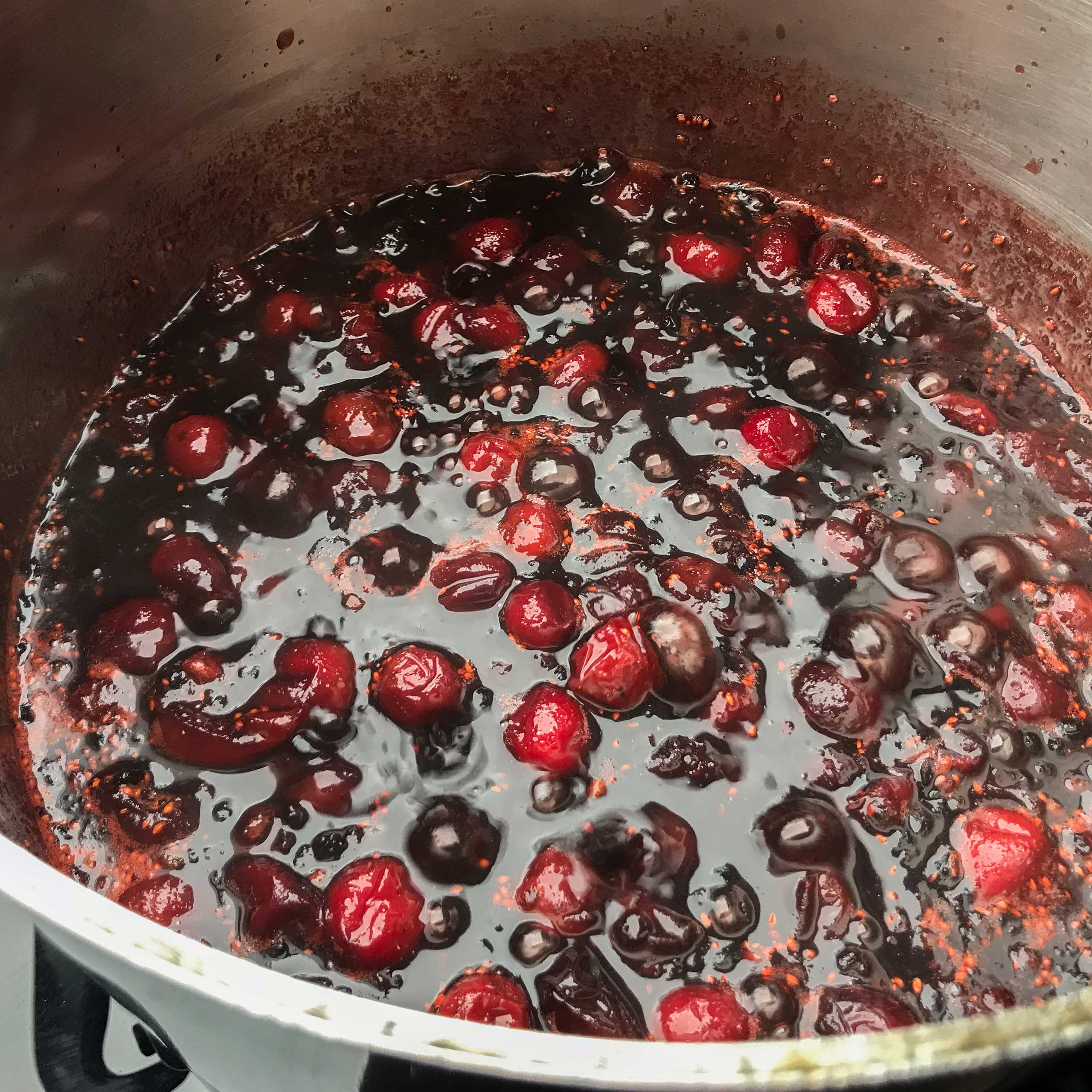 thickened cooked berries in a pot