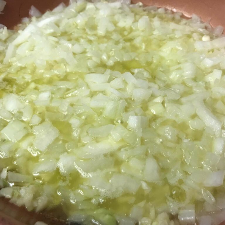 onions cooking in a skillet