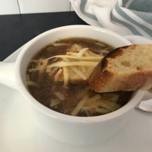 bowl of onion soup with cheese toast