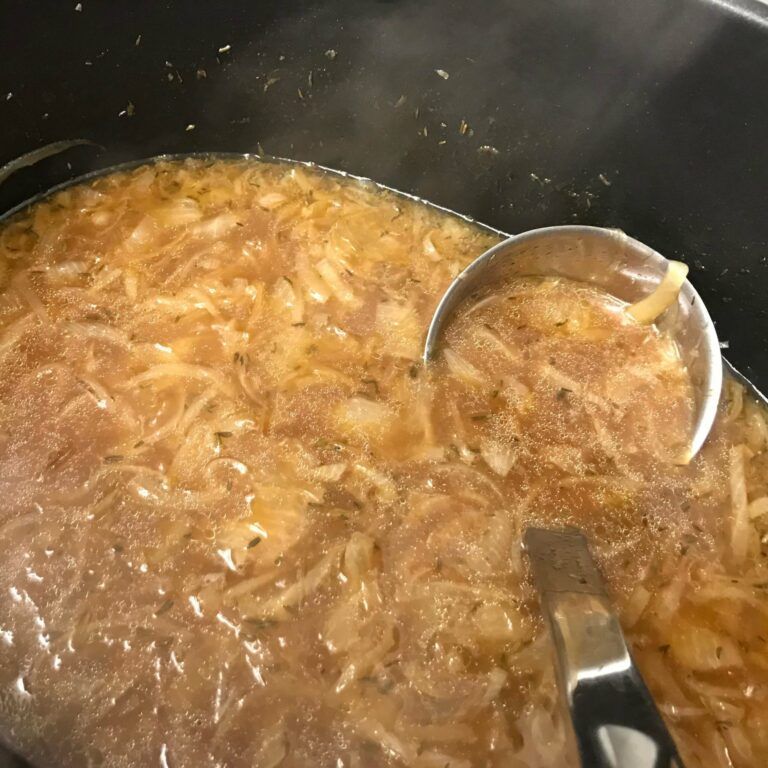 ladle in pot of soup