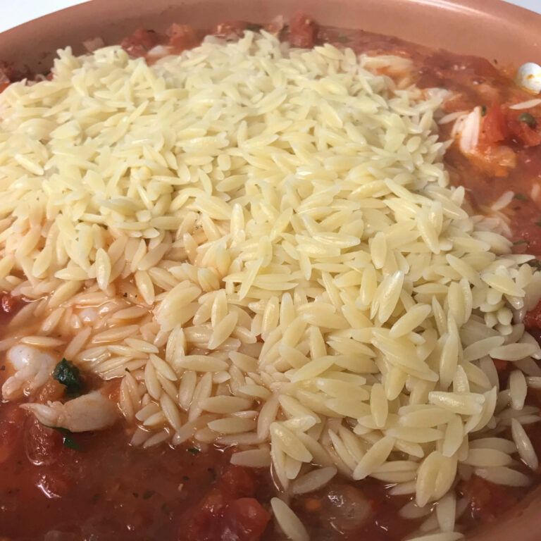orzo added to shrimp and sauce.