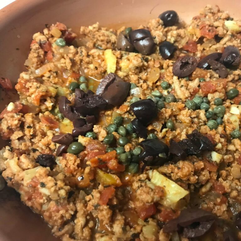 olives and capers added to turkey mixture in skillet