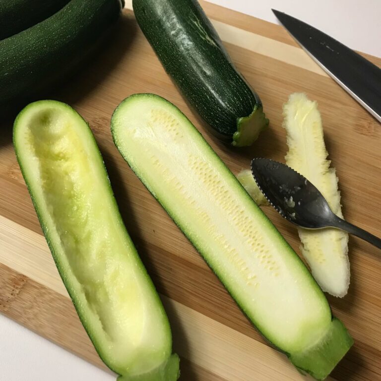 cut zucchini halves with the middle scooped out