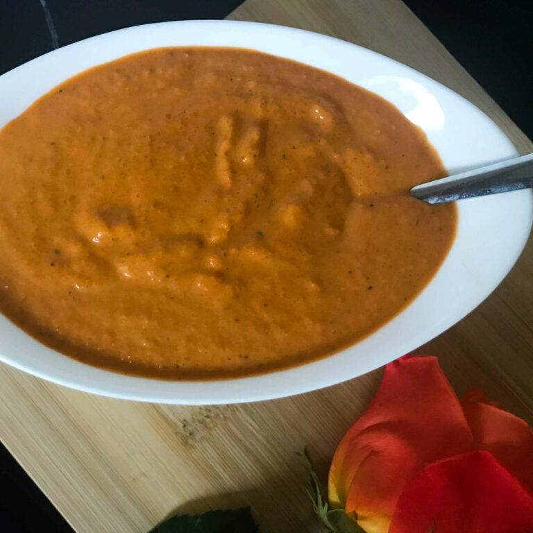 ranchero sauce in a bowl with a spoon