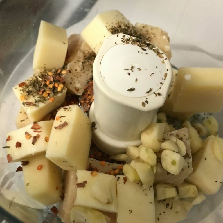 cheese and spices in a food processor