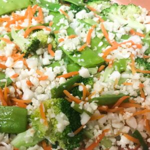 mixed veggies cooking in skillet