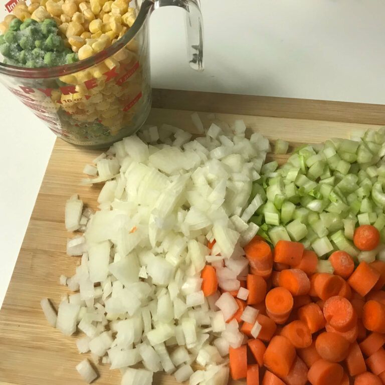 cut up veggies and frozen veggies in a cup