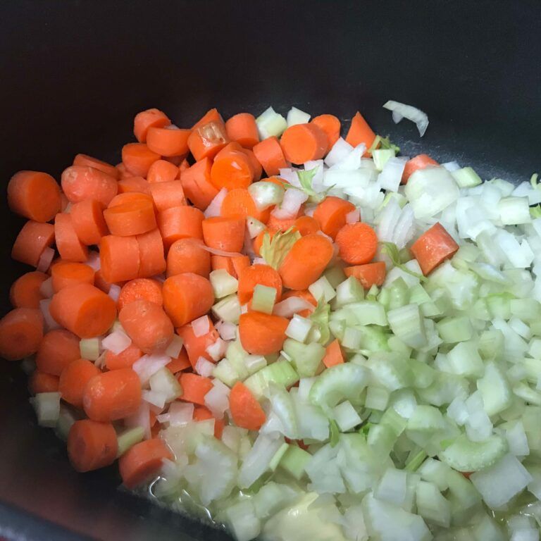cut up veggies in a pot