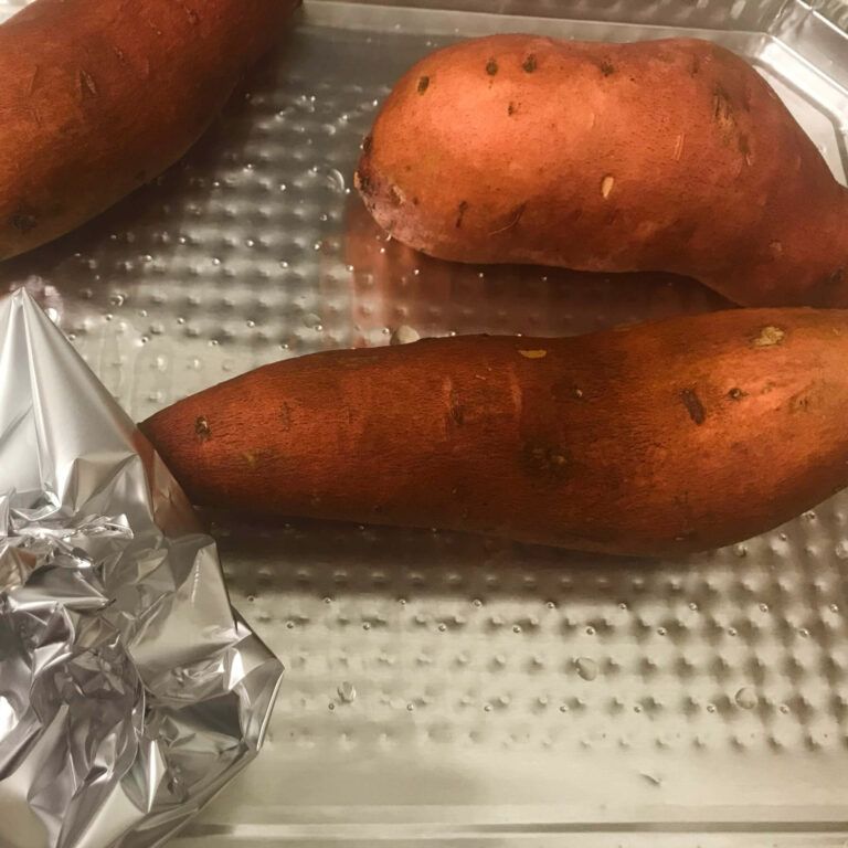 sweet potatoes on a baking sheet.