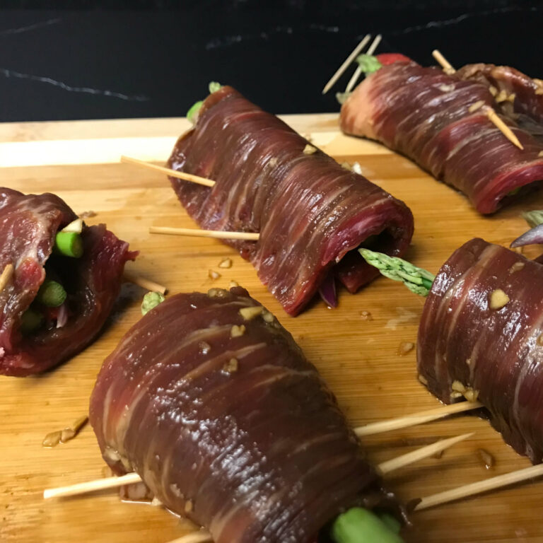 meat rolled around veggies and skewered.