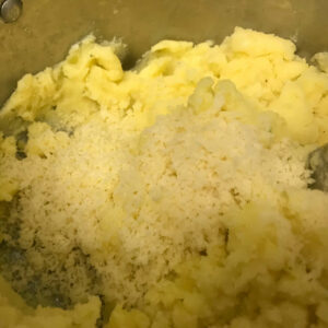 mashed potatoes with cheese.