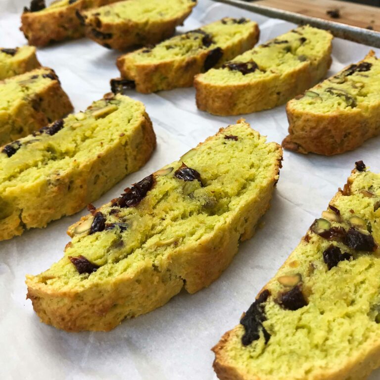 slices of biscotti on a baking tray.