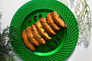 plate of pistachio and cherry biscotti cookies.