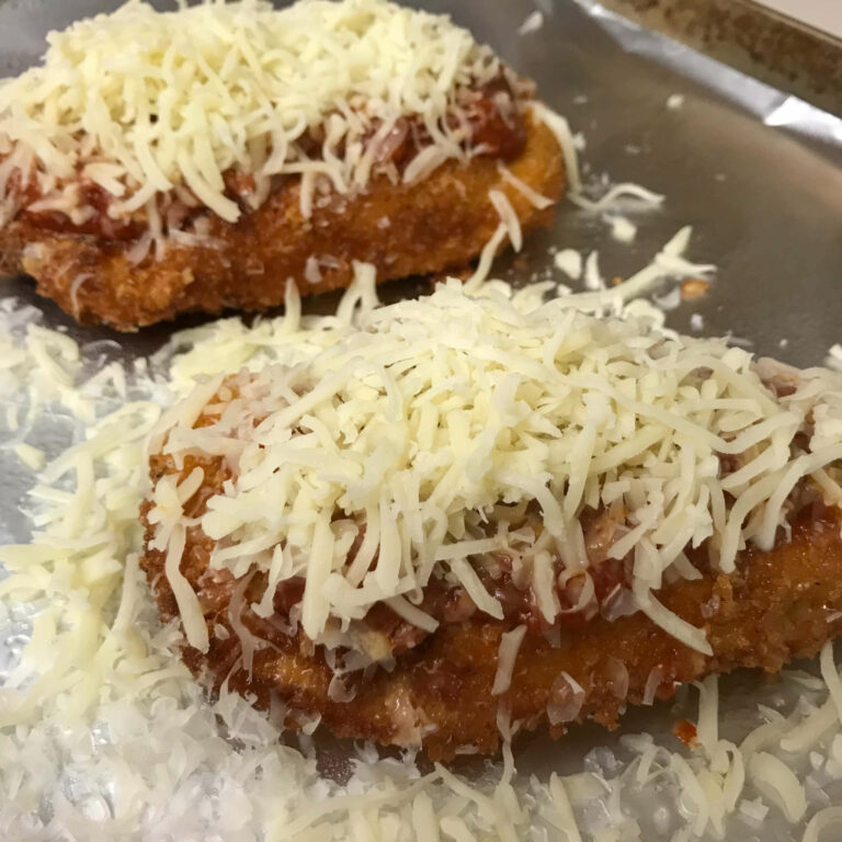 chicken cutlets topped with mozzarella.