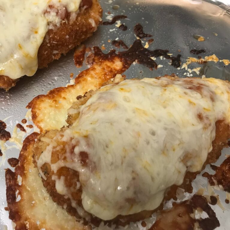 baked chicken parmesan on a sheet pan.