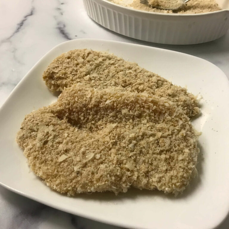 breaded chicken cutlets on a plate.