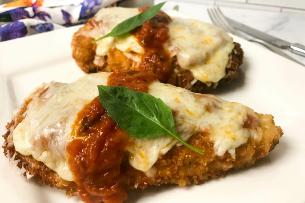 chicken parmesan on a plate.