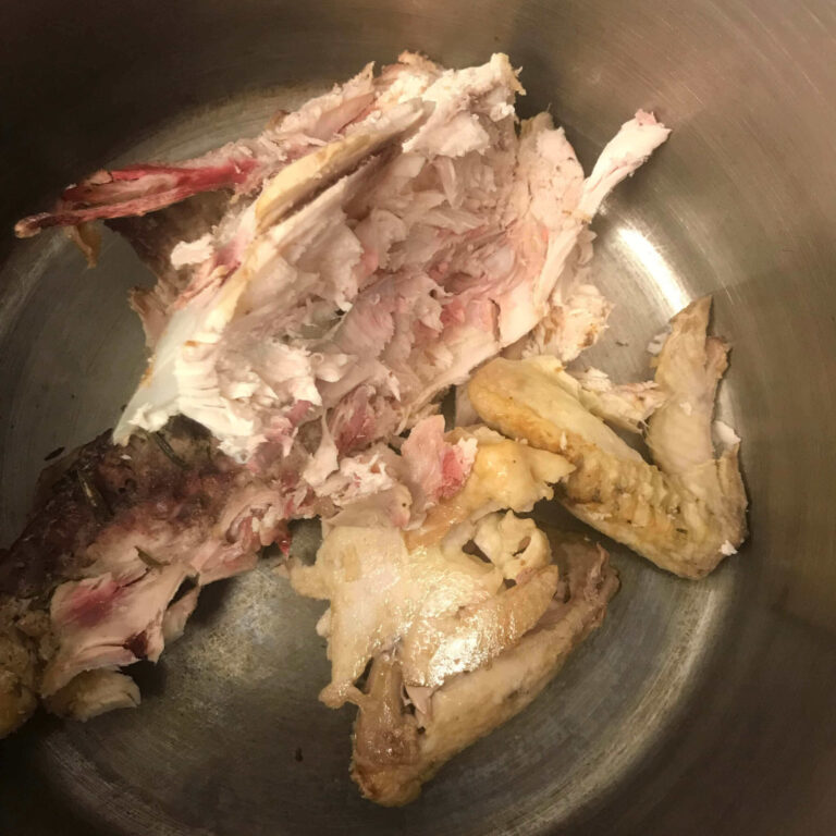 chicken bones in a pot.