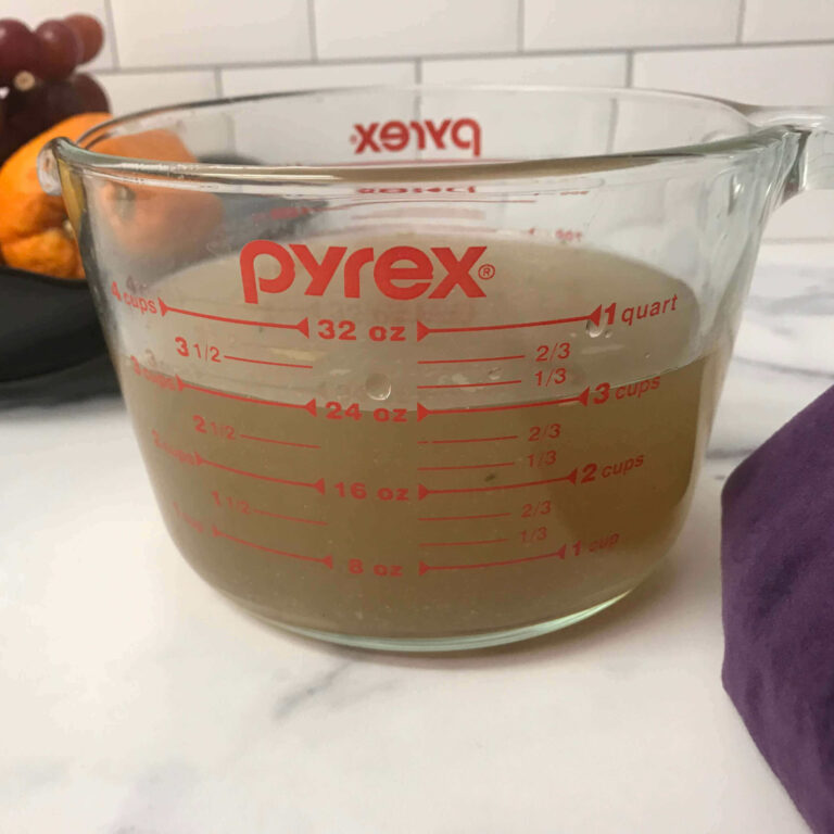 stock in a measuring cup.