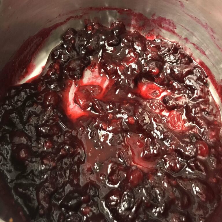 cooked cranberry sauce in a pot.