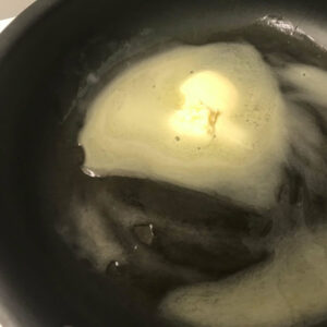 butter melting in skillet.