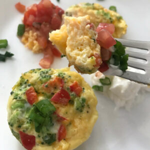 a forkful of egg muffins.