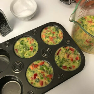 egg mixture poured into muffin tin.