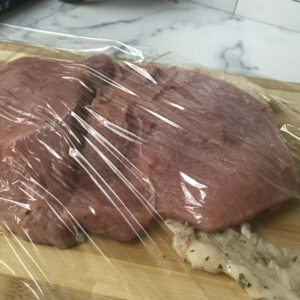 plastic wrapped turkey breast.