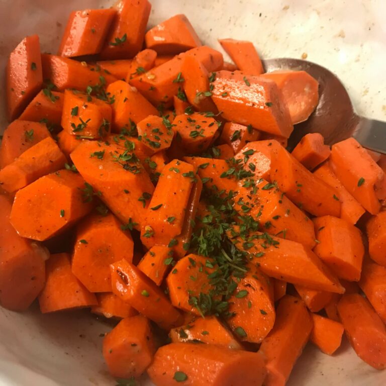 carrots and thyme in a bowl.