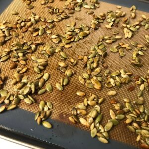 pepitas on a baking sheet.