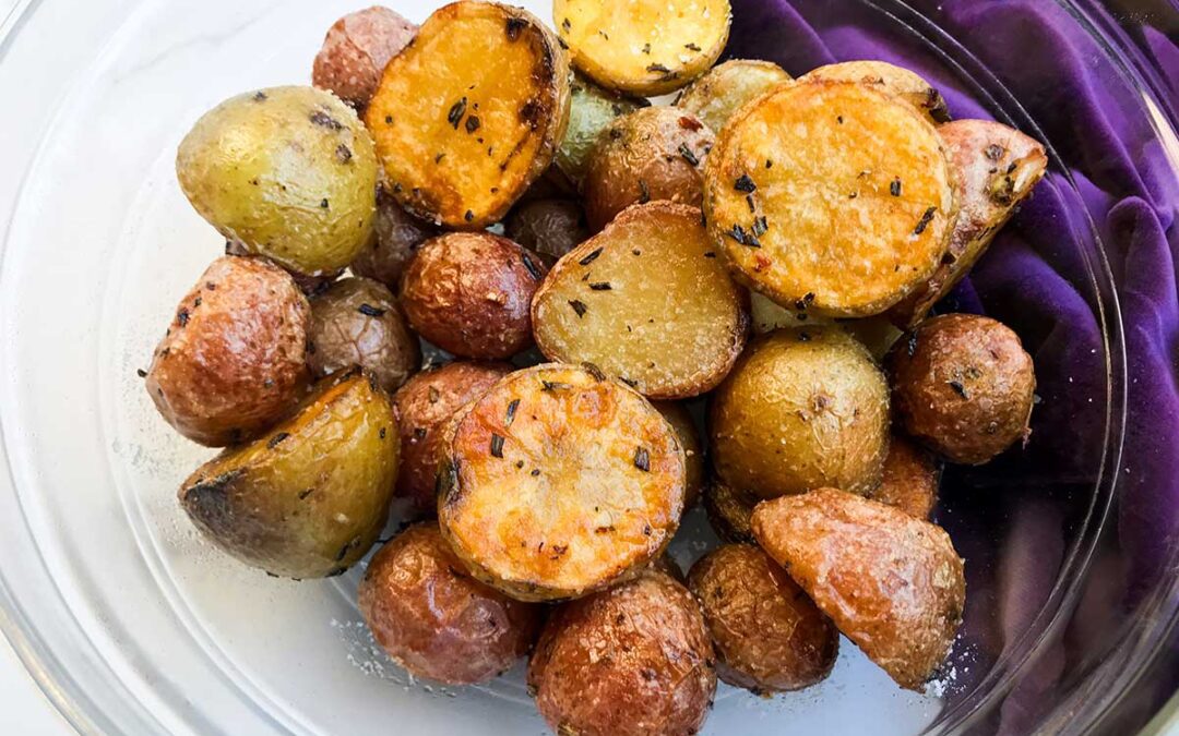 cooked potatoes in a bowl.