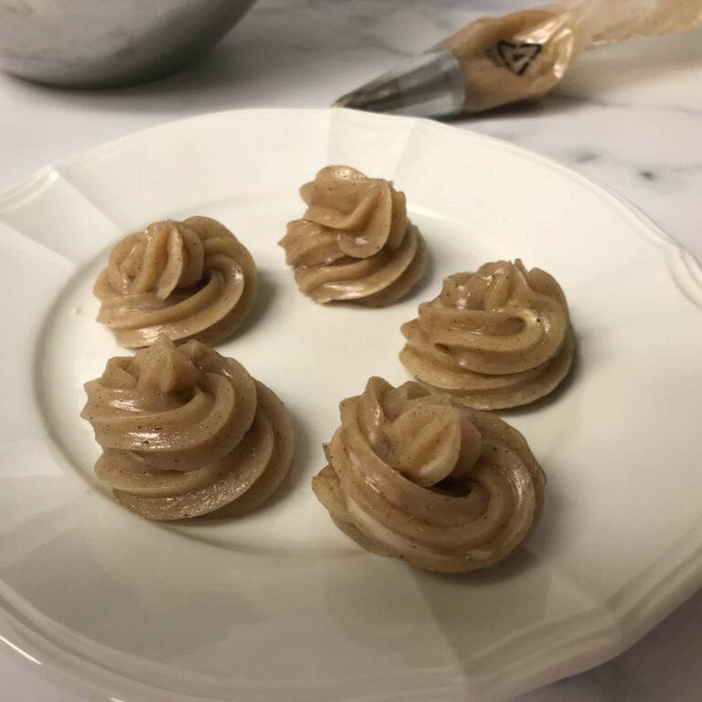 swirls of cinnamon butter on a plate.